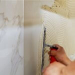 albañil aplicando cemento en pared